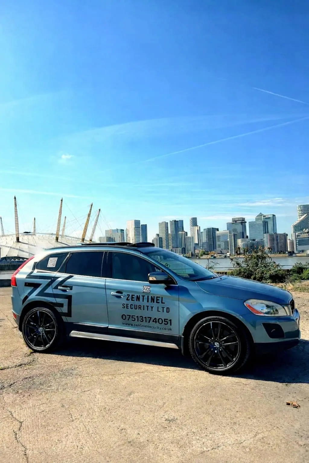 Zentinel Security branded patrol car with London skyline