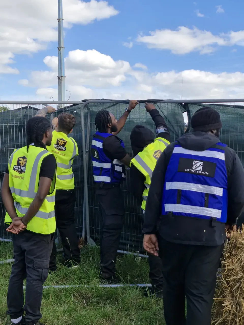 Zentinel security team installing perimeter fencing at a festival
